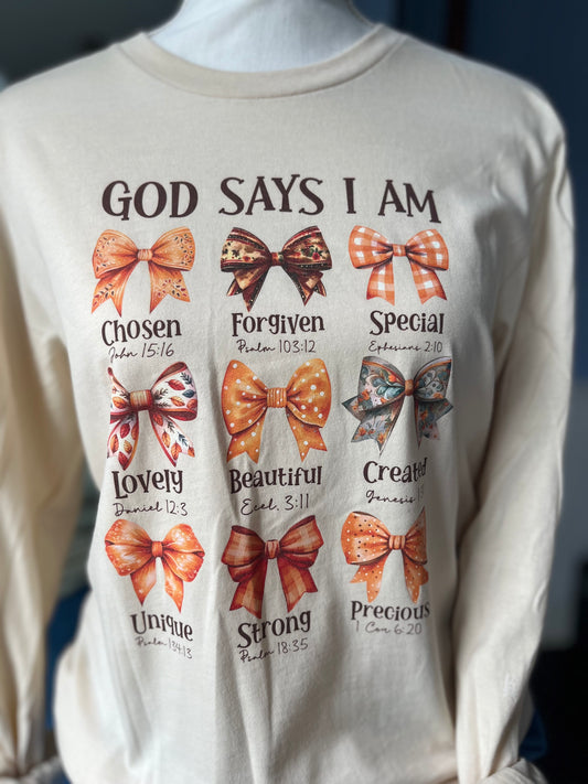 "God says I am..." Tan T-shirt with affirming bible verses.